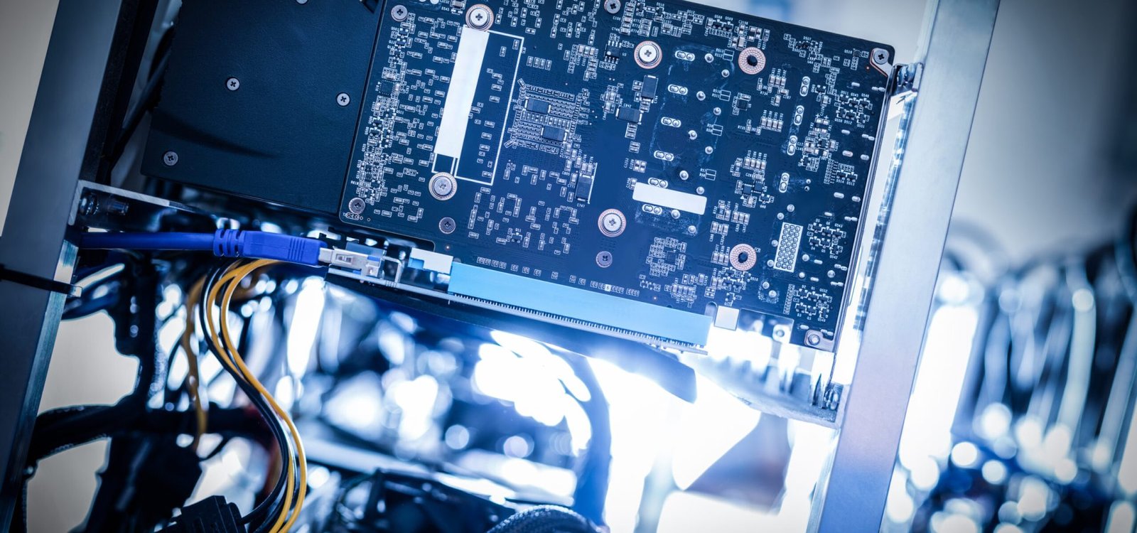 Fragment of cryptocurrency miner in a close-up shot. Bitcoin mining farm. IT hardware